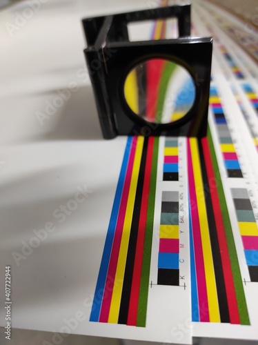Prepress color control in printing house. Selective focus.