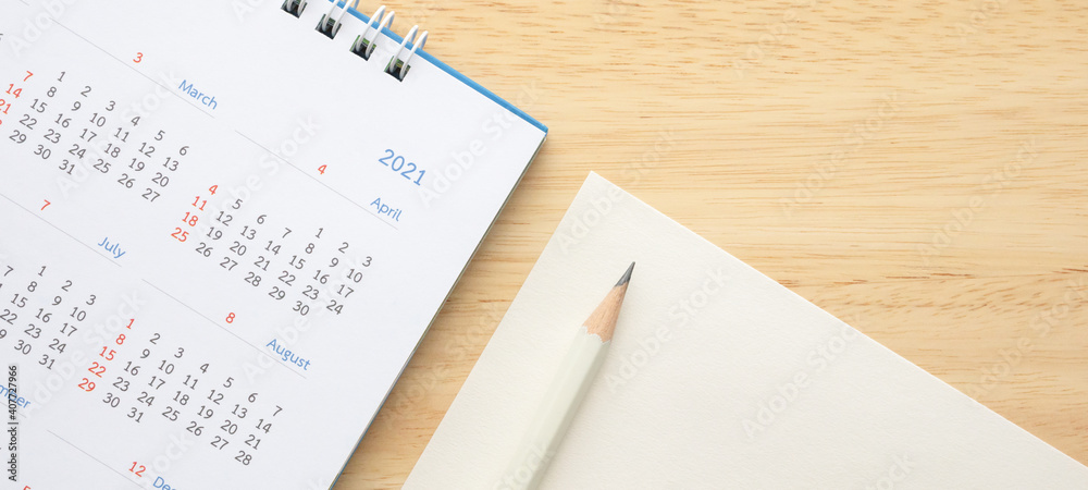 2021 calendar with pencil on wood table background business planning appointment meeting concept 2021 calendar with pencil on wood table background business planning appointment meeting concept