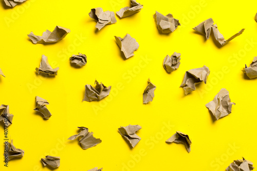 pieces of craft paper on a yellow background. place for text.