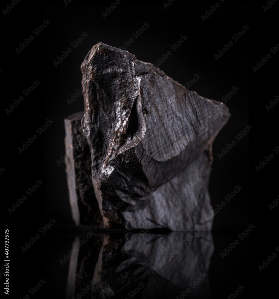 a big lumps of coal isolated on black background