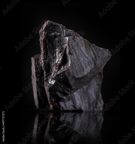 a big lumps of coal isolated on black background