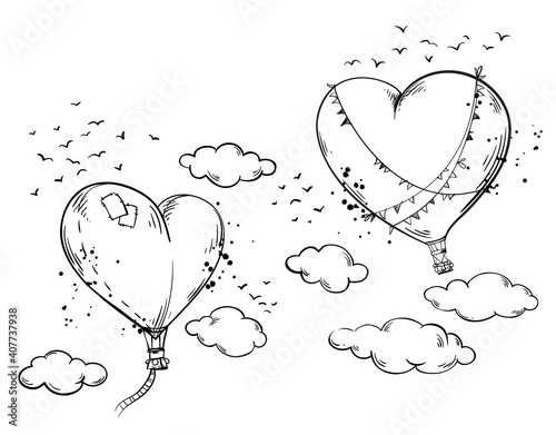 Heart shaped hot air baloons soaring in the air among clouds, romantic atmosphere