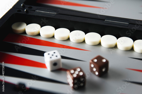 backgammon board and pieces on a white background