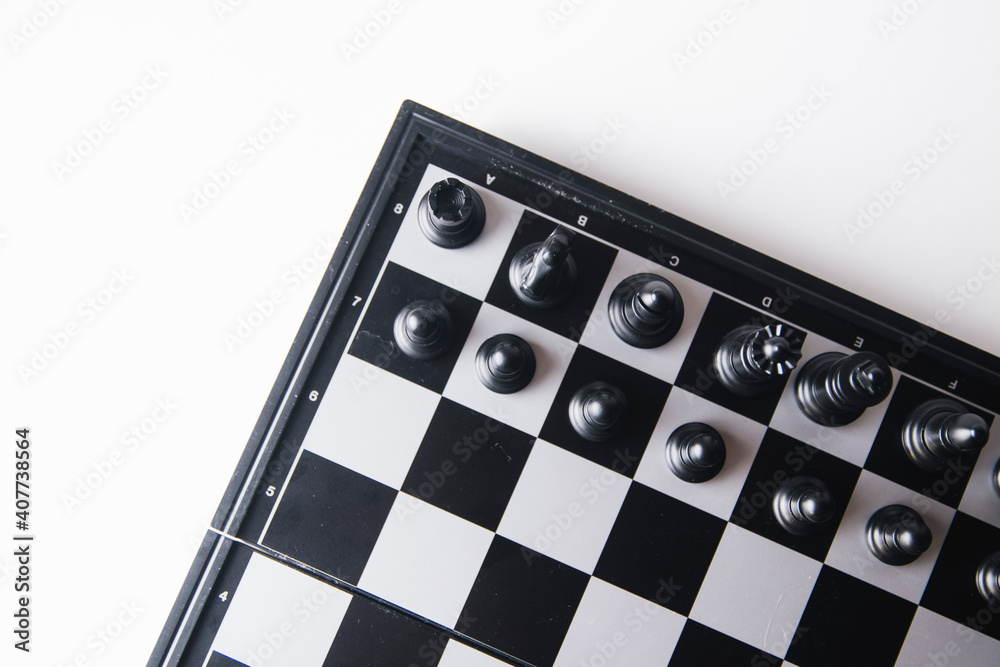 chess pieces on a white background chess pieces on a white background