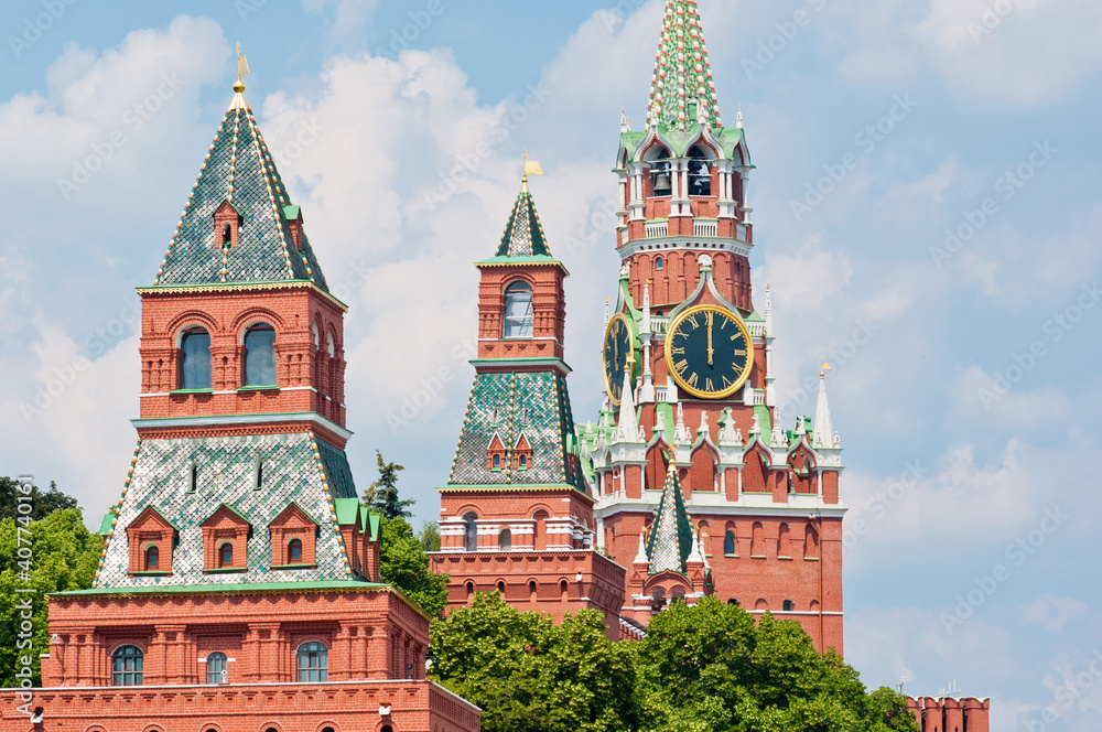 The Kremlin Clock (Kremlin Chimes). Spasskaya Tower of Moscow Kremlin. Twelve o'clock. Moscow. Russia The Kremlin Clock (Kremlin Chimes). Spasskaya Tower of Moscow Kremlin. Twelve o'clock. Moscow. Russia