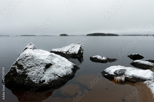 Winter landscape on the shore of lake Pielinen, Eastern Finland. photo