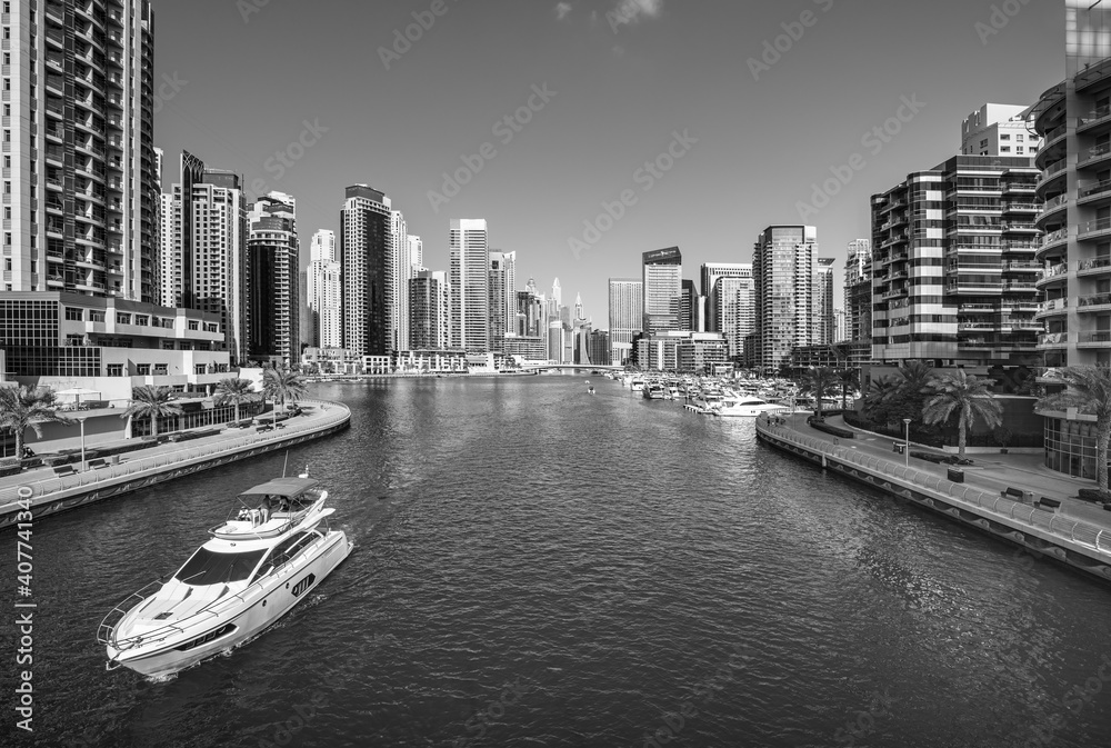Dubai skyline with reflection in the river at sunrise , Dubai, United Arab Emirates