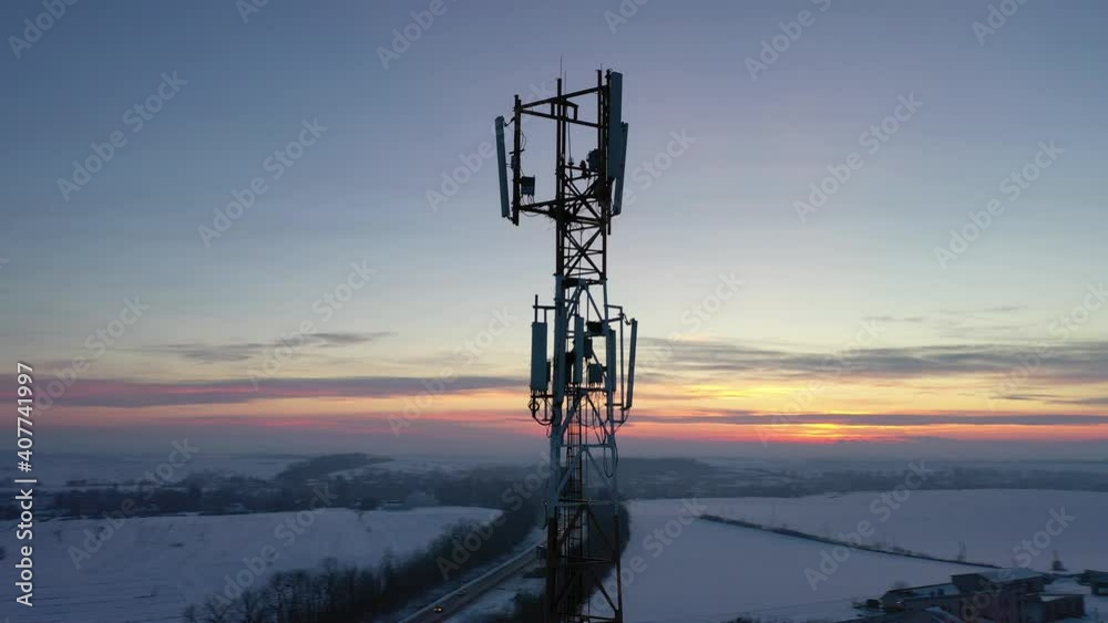 Telecommunication tower of 4G and 5G cellular. Base Station or Base Transceiver Station. Wireless Communication Antenna Transmitter. Telecommunication tower with antennas against blue sky.