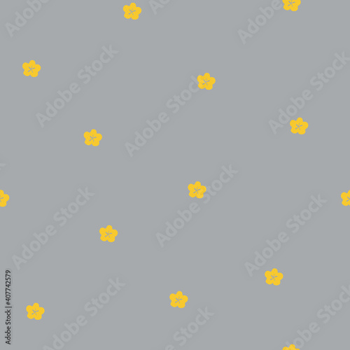 yellow small tiny flowers on gray background. seamless pattern with trendy colors . cute design for textile, kids, notebooks, cards