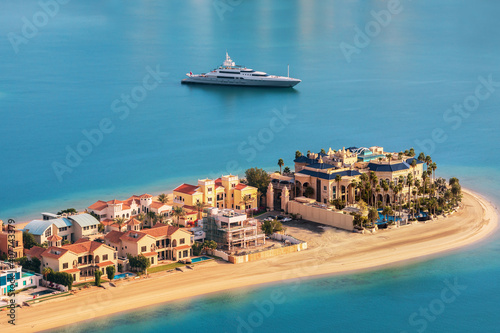 Luxury yacht on the sea near Jumeirah beach hotels in Dubai,United Arab Emirates photo