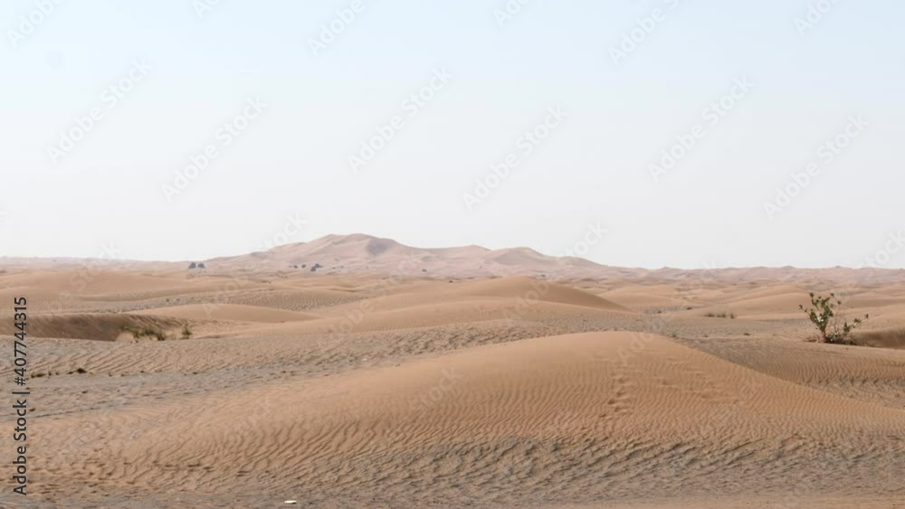 Sandy Desert Landscape With Distant Sand Dune, Sunny. Gentle Zoom In. Sandy Desert Landscape With Distant Sand Dune, Sunny. Gentle Zoom In.