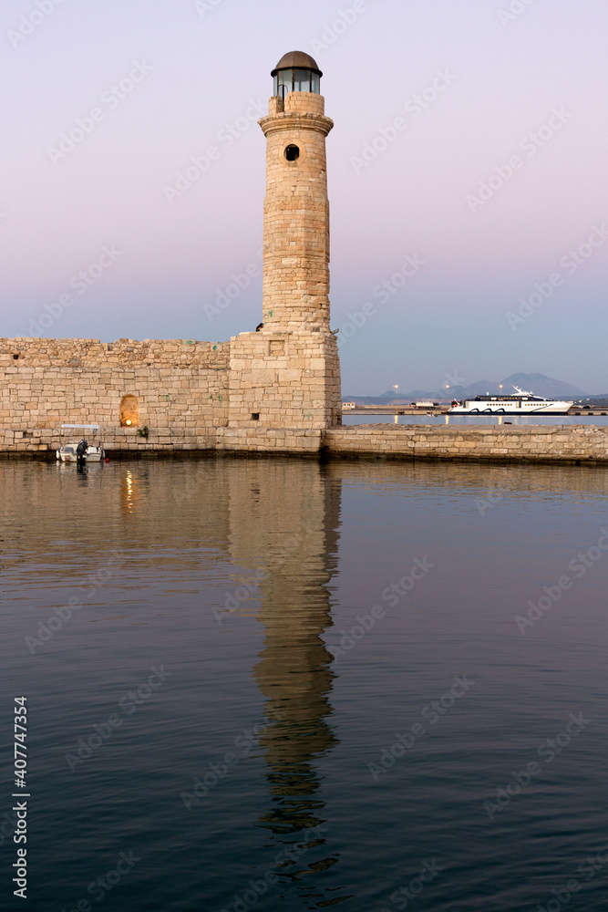 Crete - Egyptian lighthouse of the Venetian harbor of Rethymno at the night, second largest remaining Egyptian lighthouse in Crete. Greece
