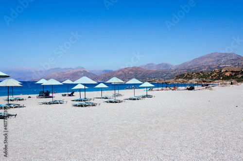 Crete - Scenic seaside of Triopetra beach. Beautiful long pebble beach with few sunbeds. Rethymnon, Greece 