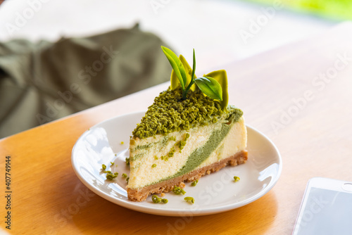 Green tea cheese cake on white dish