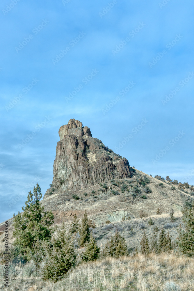 jagged mountain peak with blue sky