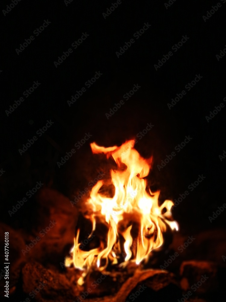 Blurred natural flame, the texture of the campfire at night, strong flames, flame background Blurred natural flame, the texture of the campfire at night, strong flames, flame background
