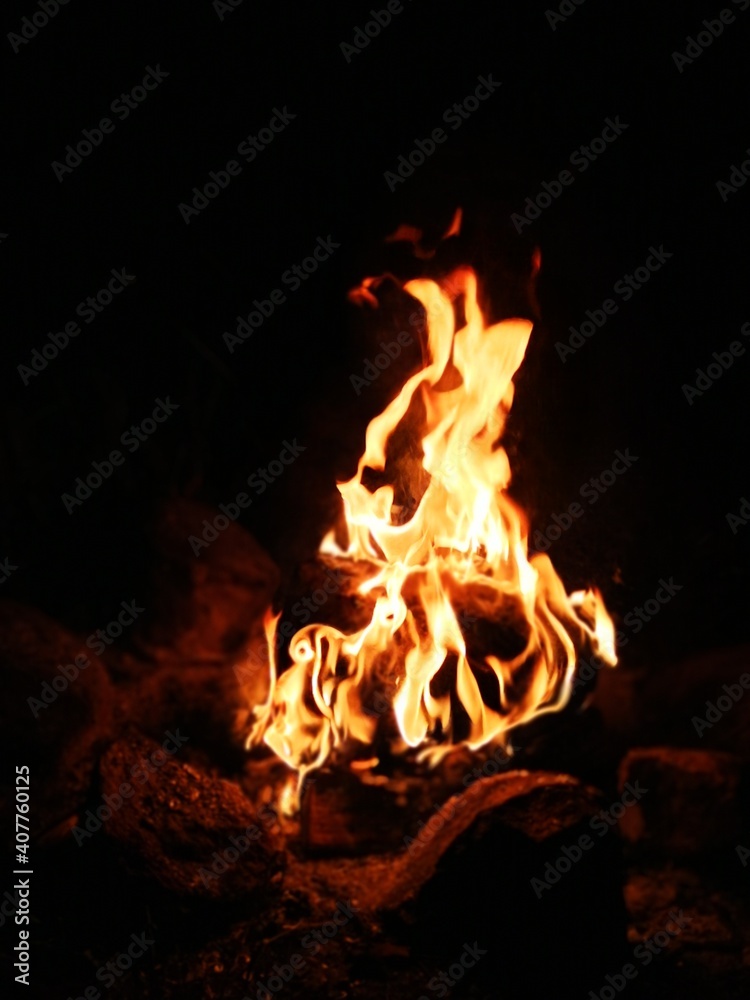 Blurred natural flame, the texture of the campfire at night, strong flames, flame background Blurred natural flame, the texture of the campfire at night, strong flames, flame background