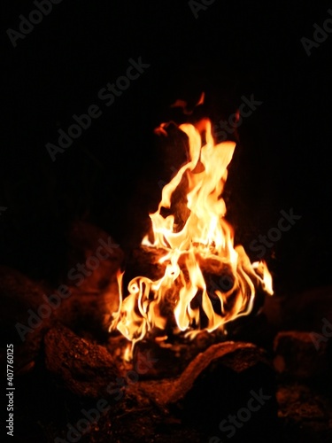 Blurred natural flame, the texture of the campfire at night, strong flames, flame background