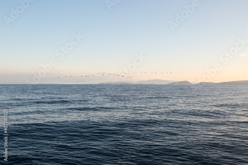 Ionian Sea. Calm and peaceful time at open sea before the sunset.