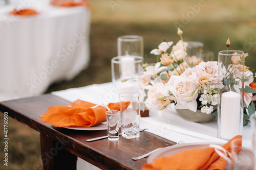 wedding table decoration with flowers on the table, dinner table decor photo