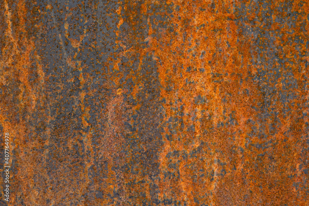 Metal surface with bright rusty spots