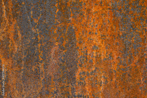 Metal surface with bright rusty spots