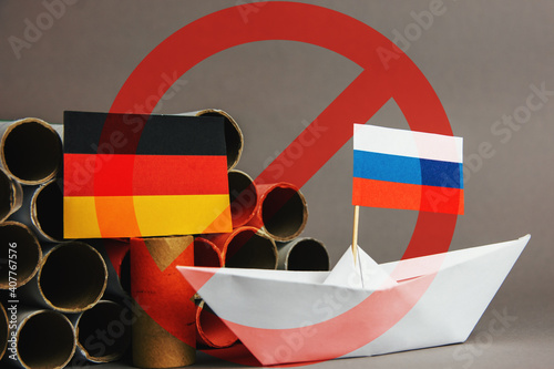 abstract vision Nord Stream 2 US sanction, gas pipes and flag of russia, germany photo