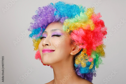 Wearing colored wig Oriental young lady