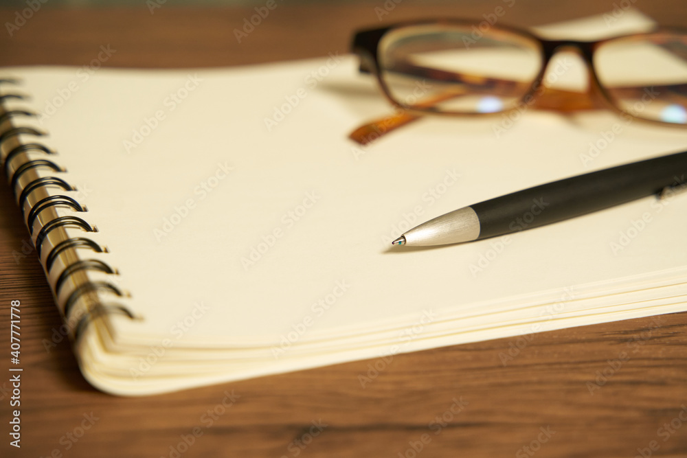 Glasses and notebook Glasses and notebook