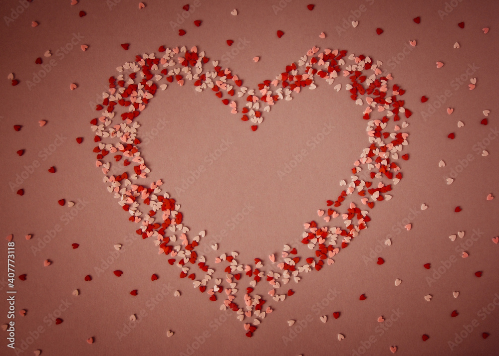 heart, a symbol of love on a red background with small hearts
