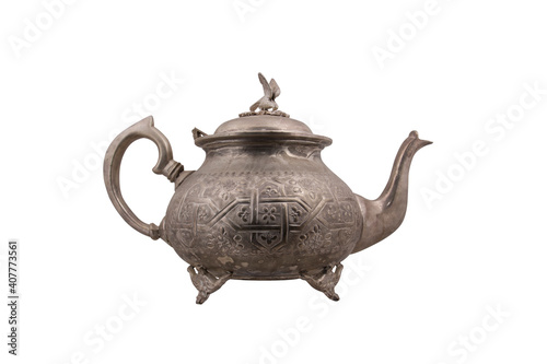 An antique kettle of silver - copper isolated on white background