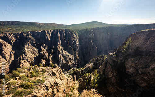 Wide shot view of rocky deepness of black canyon of gunnison national park at sunny day in amerika