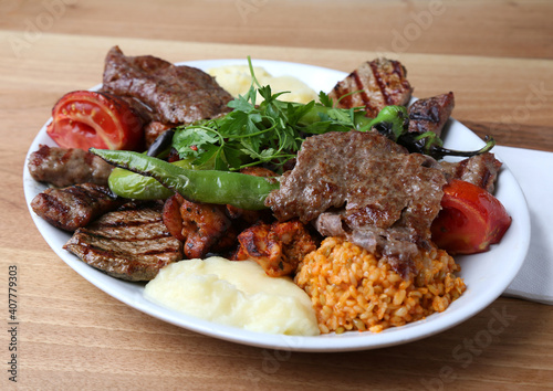 Mixed kebab with bulgur pilaf and mashed potato