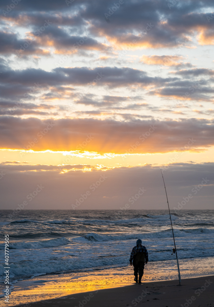 Fisherman at the Ocean at Sunrise