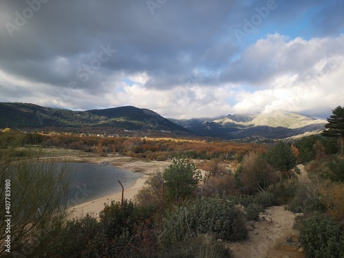 Lake in the mountains in autumn with clouds © mirebel