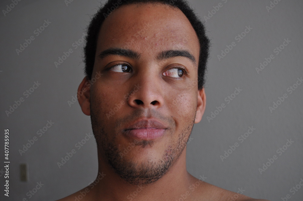 Obraz premium Mixed Race man stubbled face expression longing