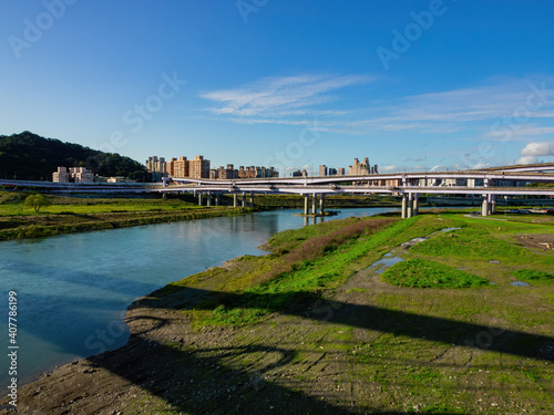 Afternoon view of the river cityscape of Xindian District area © Kit Leong