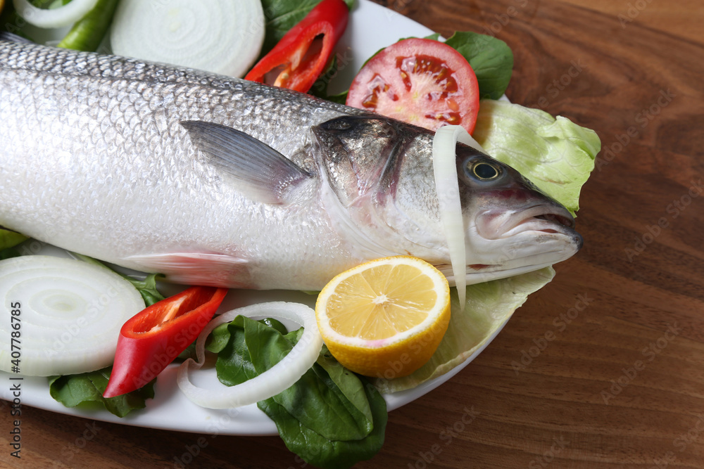 Raw bonito with onion lemon and tomato Raw bonito with onion lemon and tomato