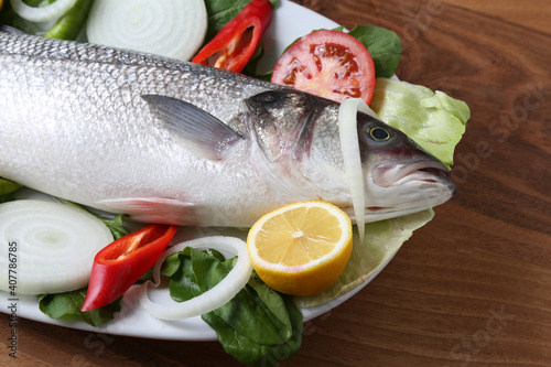 Konstfotografi Raw bonito with onion lemon and tomato