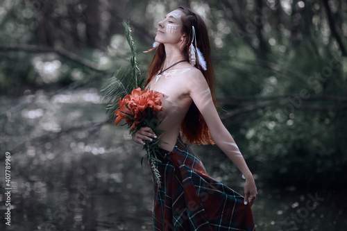 Obraz na plátně Mystic modern witch dances by a lake in a summer forest
