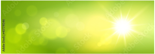 Green bokeh lights with radiating sunlight banner