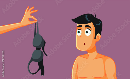 Man Looking at a Bra Ready for Romantic Affair