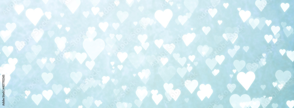 valentines day - defocused white hearts background on blue background - february 14 valentines day - defocused white hearts background on blue background - february 14