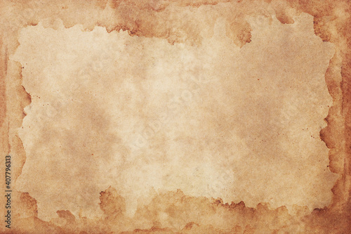 Old brown paper grunge background. Abstract liquid coffee color texture.