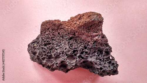 Foto specimen Scoria igneous rock, black and brownish red color from the central java volcano, Indonesia