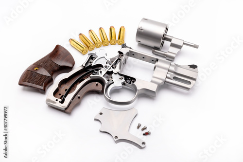 .44 magnum revolver pistol  handgun and bullets on white background photo