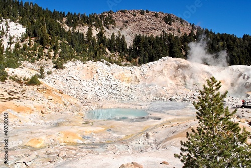 Bumpass Hell is the largest hydrothermal or geothermal area in Lassen Volcanic National Park in California with hot springs, fumaroles, and boiling mudpots. A boardwalk keeps visitors safe.  photo