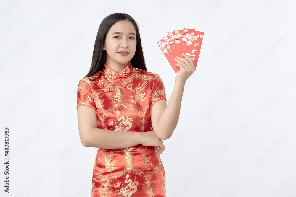 Asian woman in traditional red cheongsam dress Asian woman in traditional red cheongsam dress