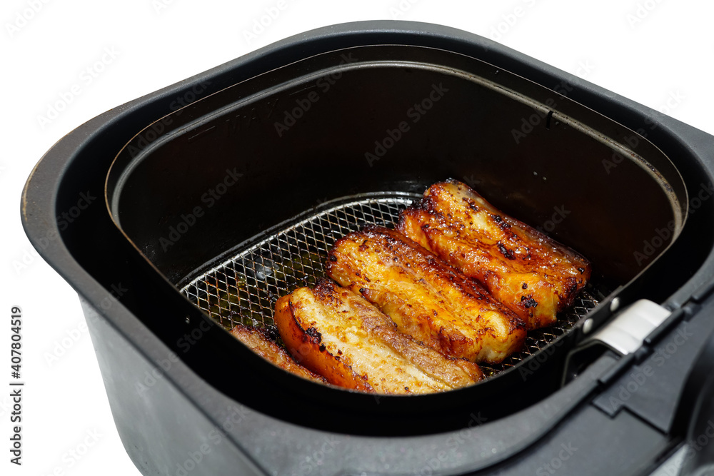 Salt and pepper, and Gochujang Korean sauce fermented pork belly roasted in air fryer to reduce less oil and fat isolated on white background