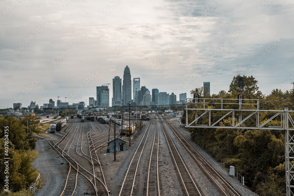 Charlotte City skyline and train rails